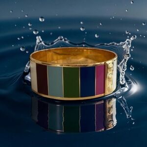 Coach Legacy gold tone bangle bracelet NWOT